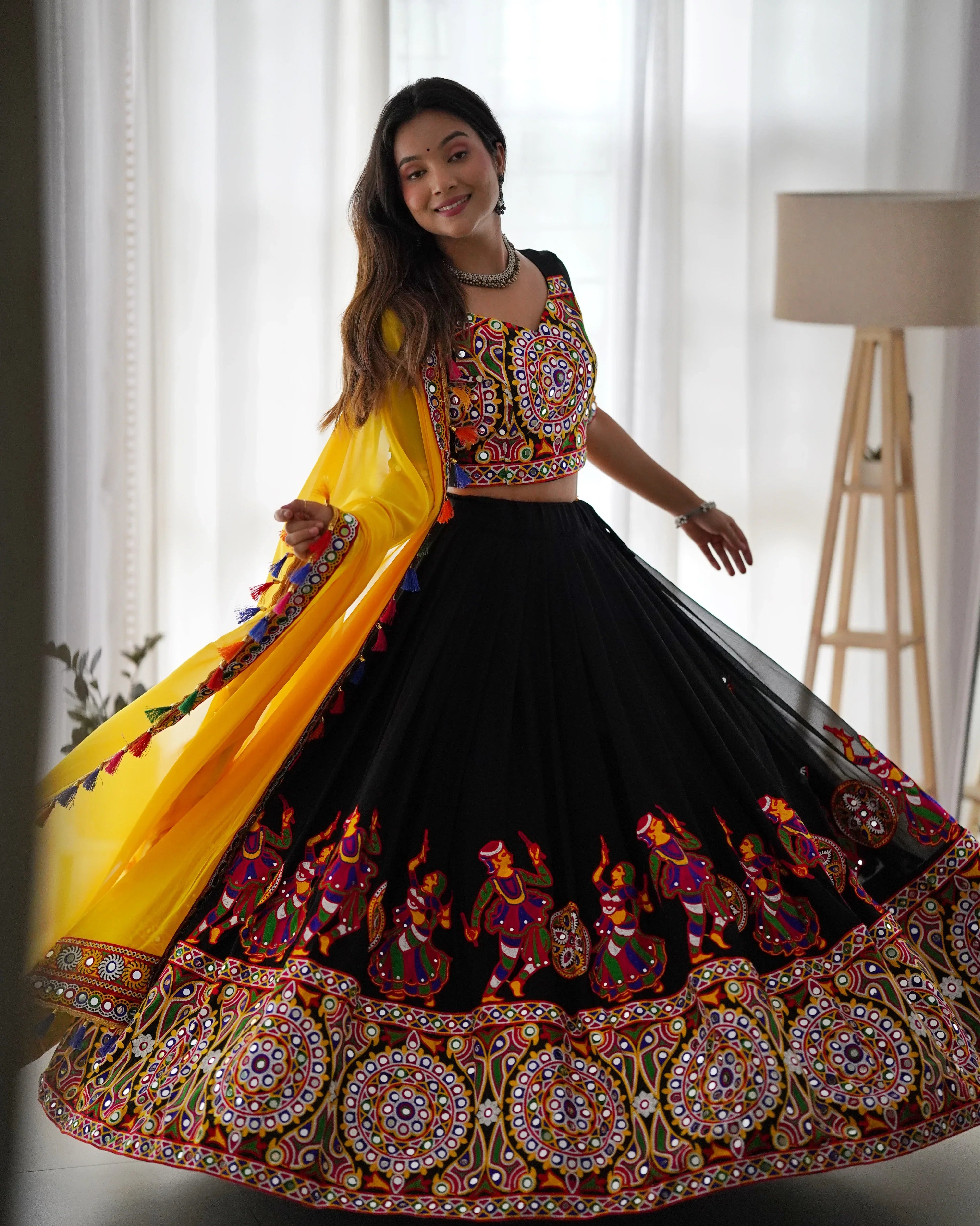 Black gamthi chaniya choli 4-metre flair twirl view for Navratri garba
