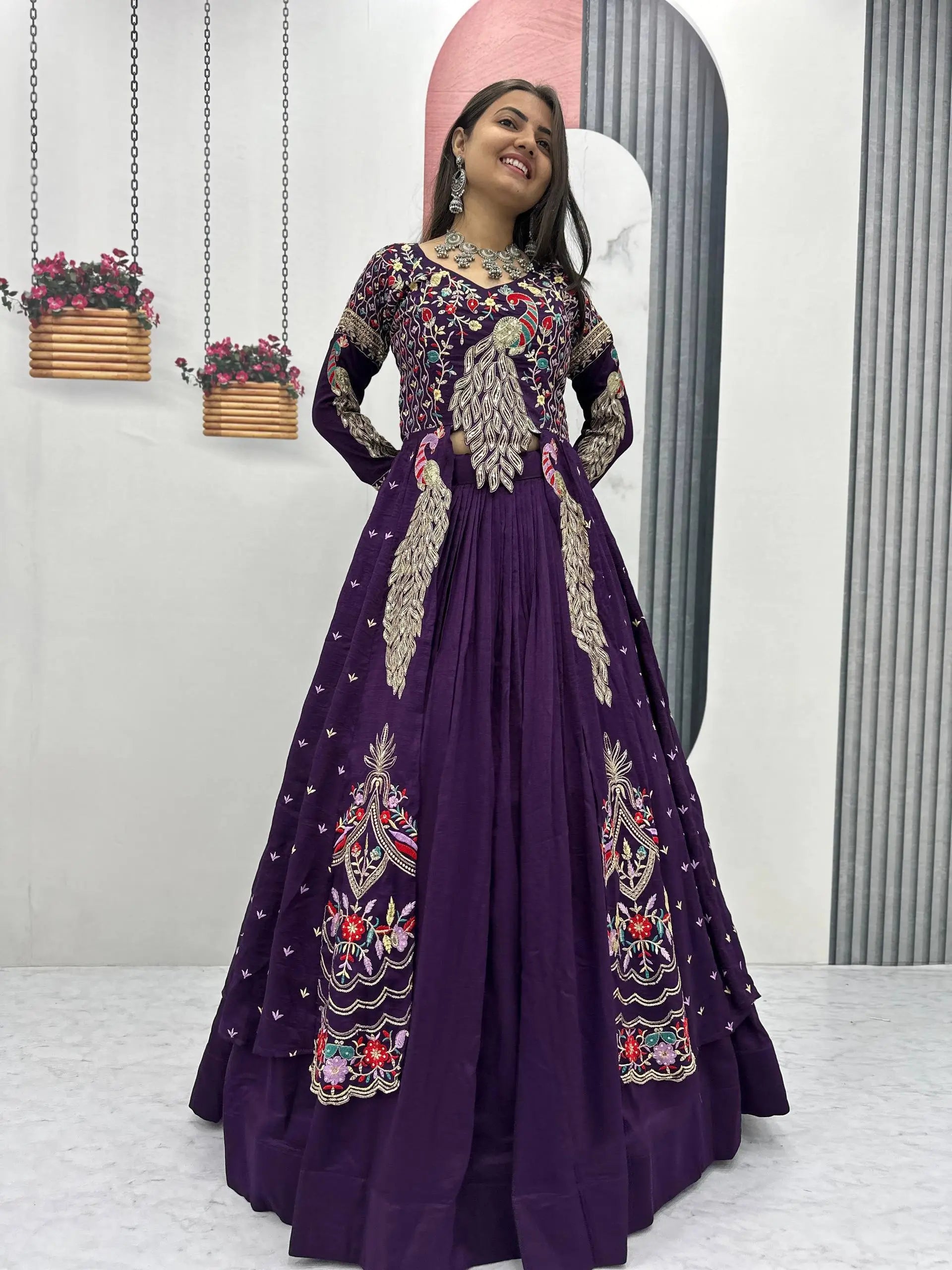 Side view of deep purple embroidered lehenga with peacock motif in Vichitra silk for traditional occasion wear