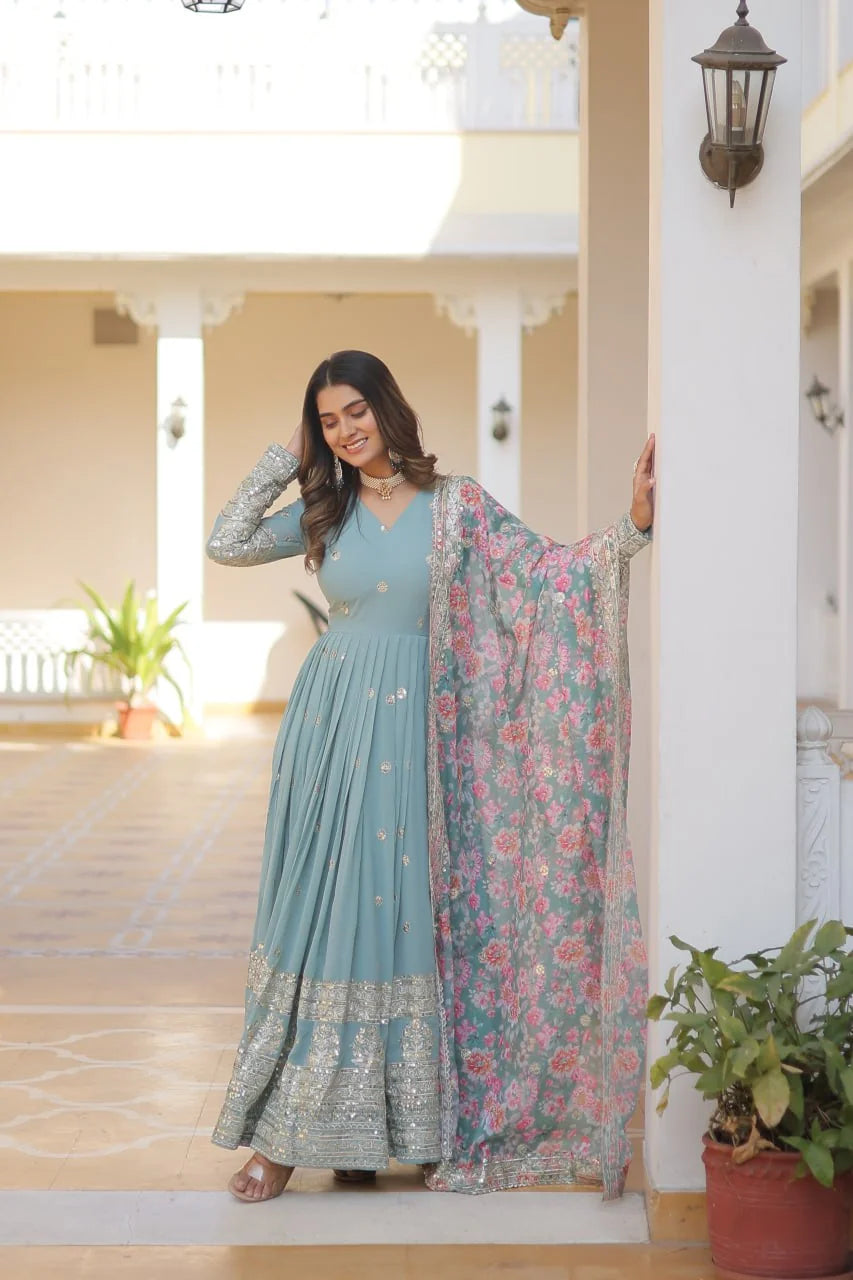 sky blue floral printed gown with dupatta leaning full view