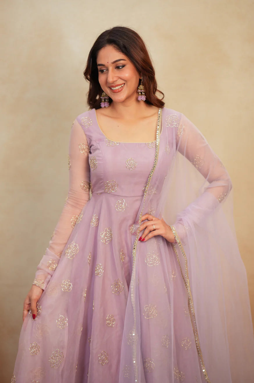 Gold rose embroidery detail on lavender organza anarkali set with net dupatta β close-up