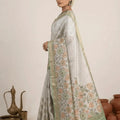 Elegant Pastel Floral Linen Tissue Saree with Zari Border & Designer Pallu