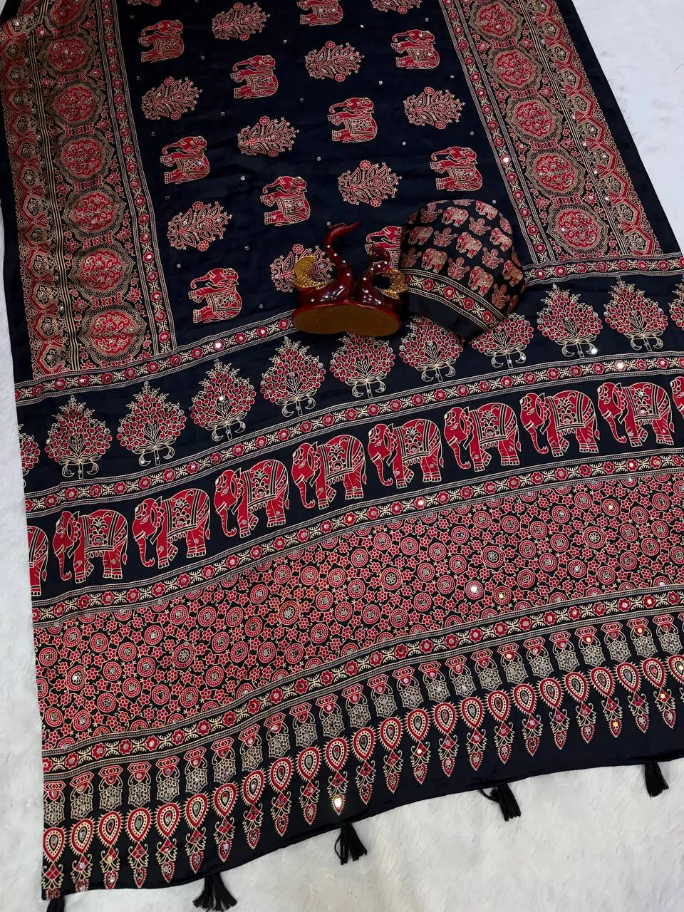 Ajrakh elephant print saree black with red elephant motifs and gold floral trees pallu