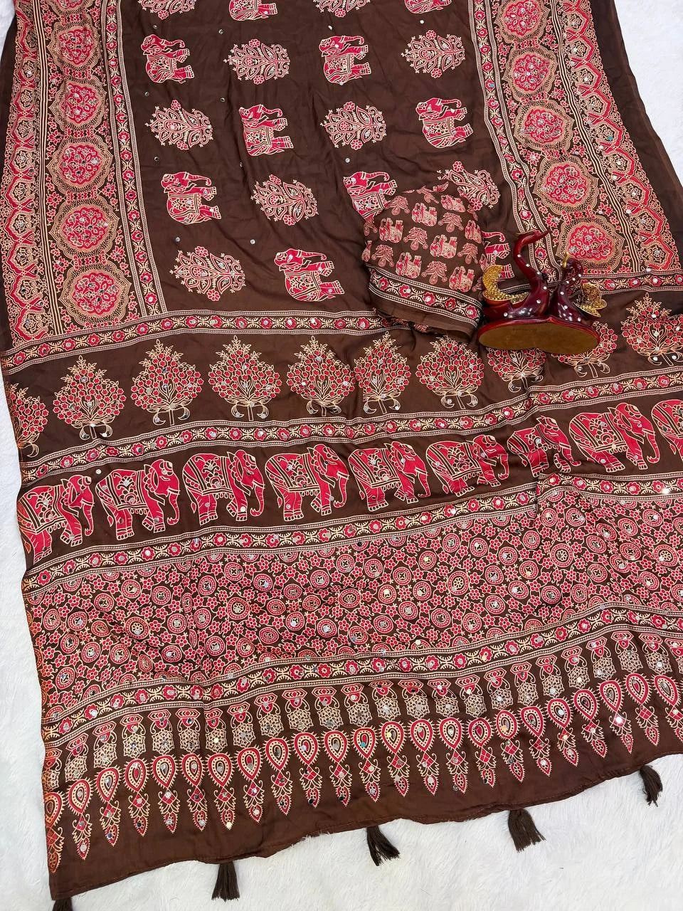 Ajrakh elephant print saree with mirror work brown chocolate with red elephant motifs – flat lay