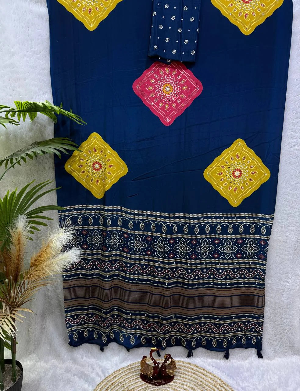 Ajrakh saree navy blue with pink and yellow Ajrakh medallion motifs – full flat-lay view