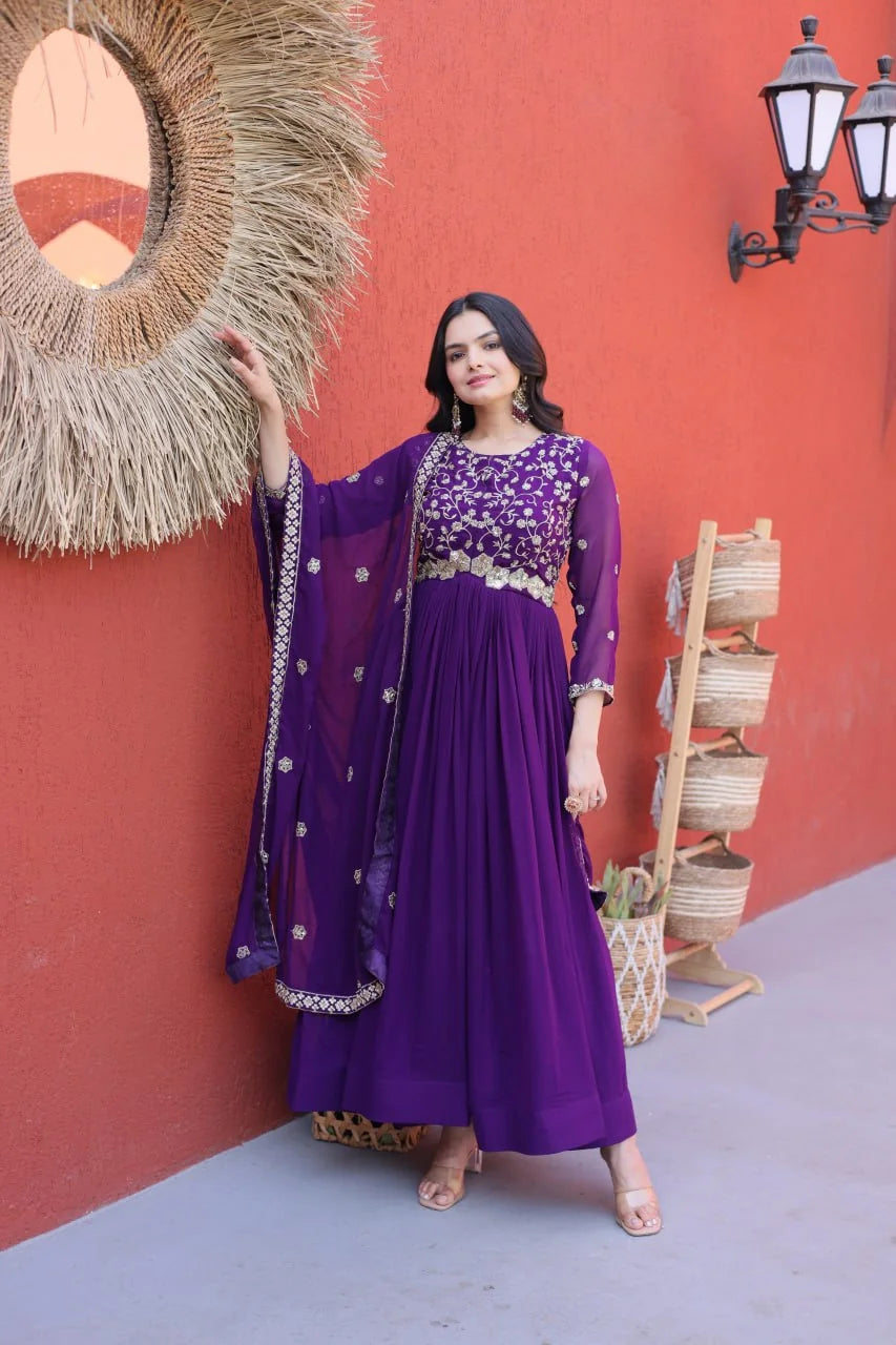 purple anarkali gown with dupatta full front against red wall