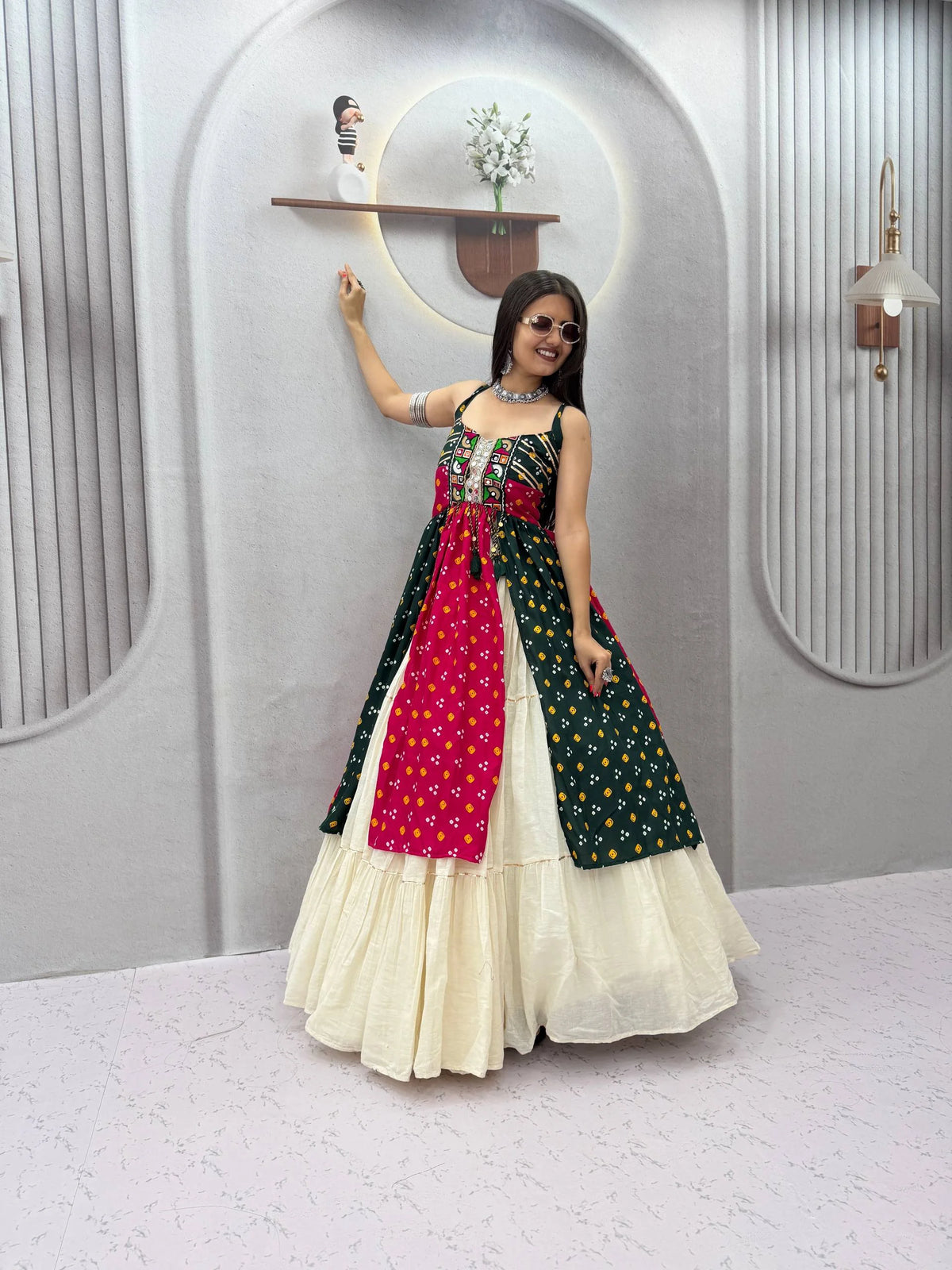 green pink bandhej navratri chaniya choli side pose with 9 meter flair
