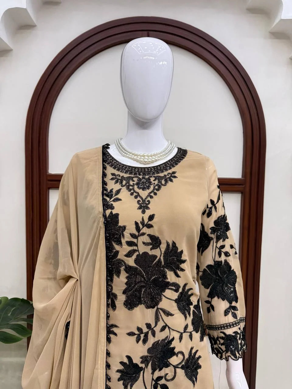 beige embroidered palazzo set front view festive black cutwork border