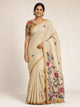 beige linen saree with silver check weave and hand-painted bird floral pallu