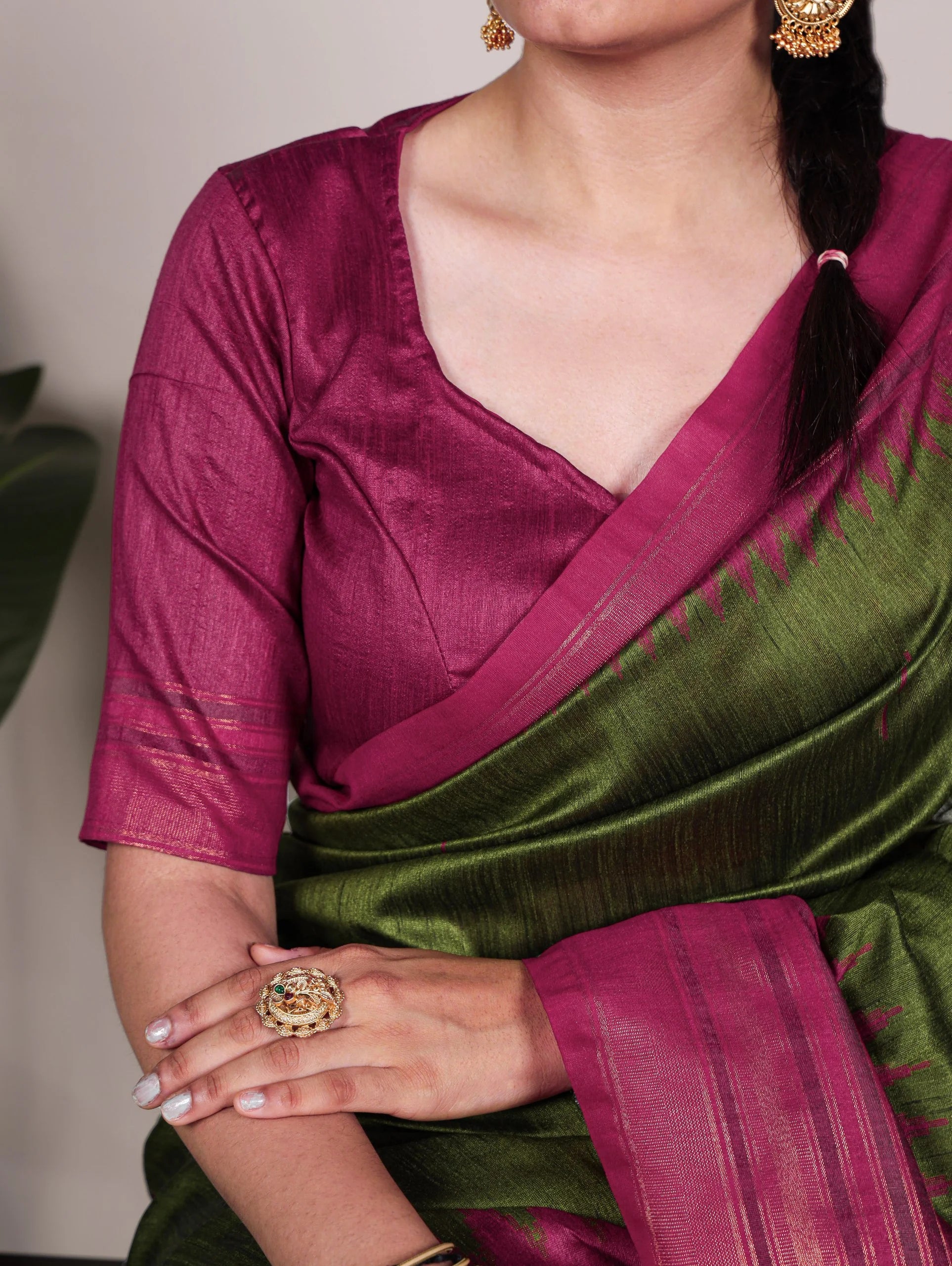 olive green bhagalpuri silk saree pink blouse close up seated