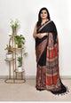 black ajrakh print saree with maroon ethnic printed border and tassel pallu