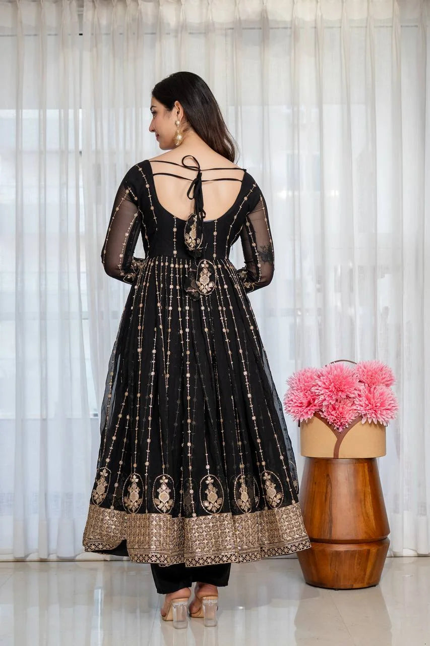 Black anarkali suit open-back tie design with gold zari embroidery – back view