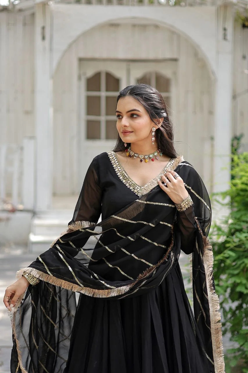 black gown with dupatta full length white backdrop