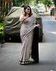 black and white striped saree in modal silk with digital print and contrast pallu