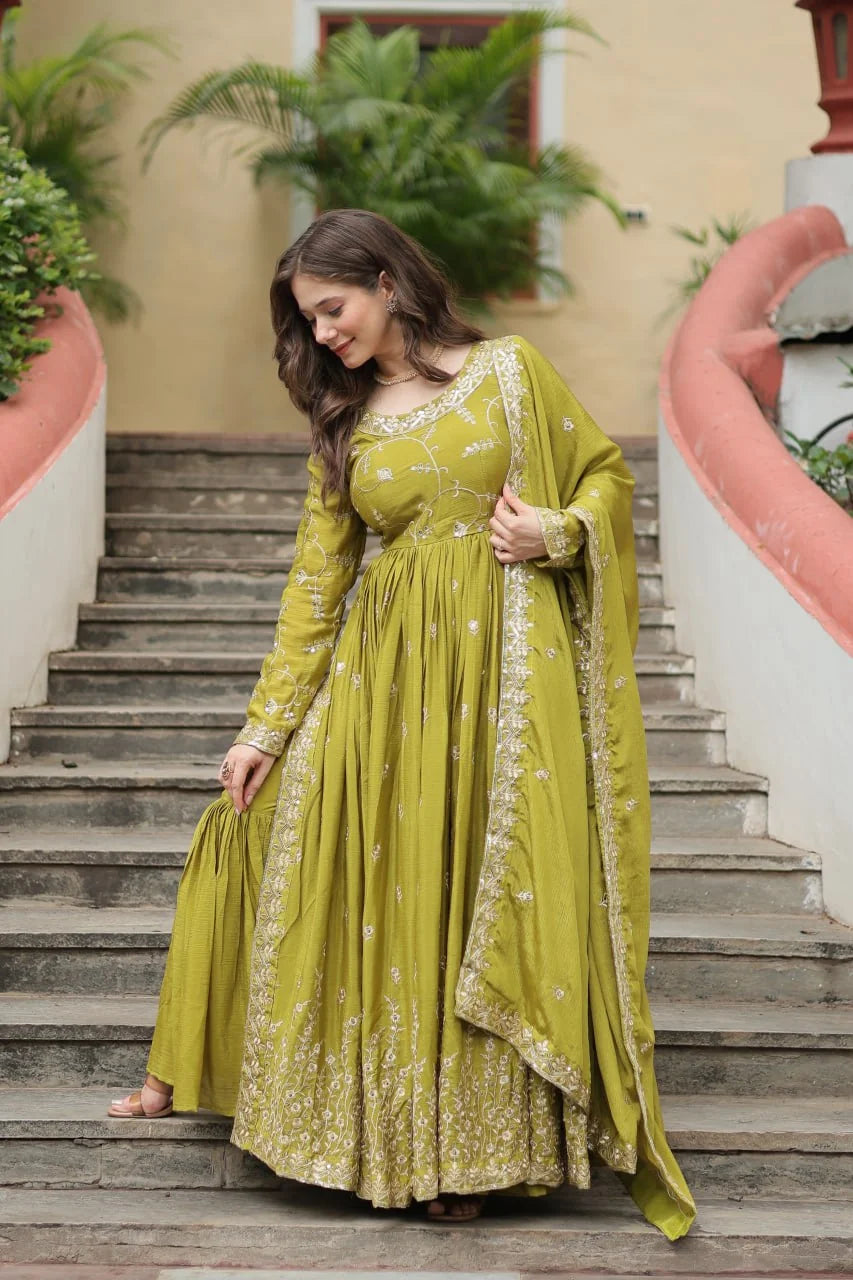 olive green chinon sharara suit for women smiling closeup