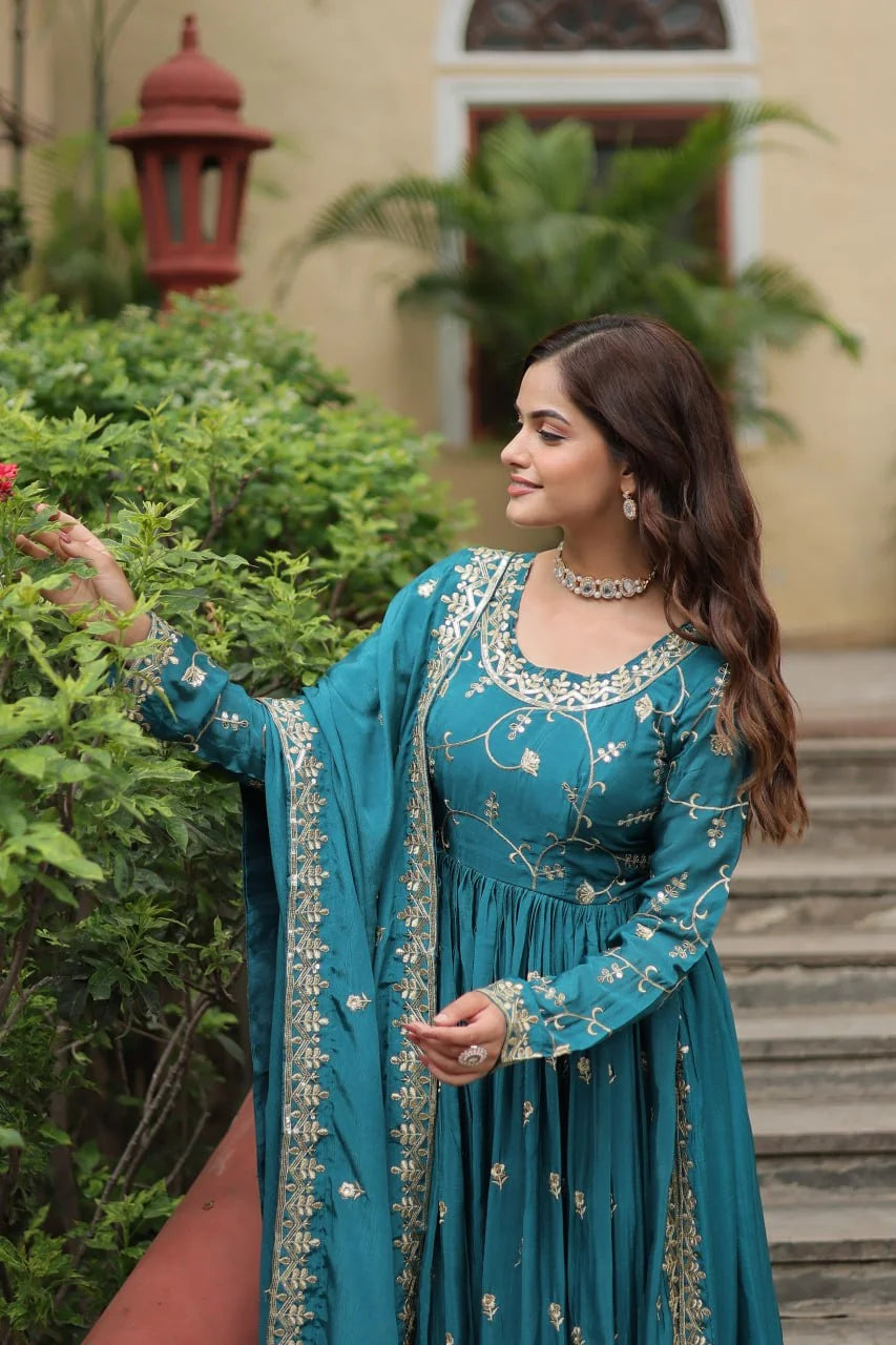 teal blue chinon sharara suit for women garden pose