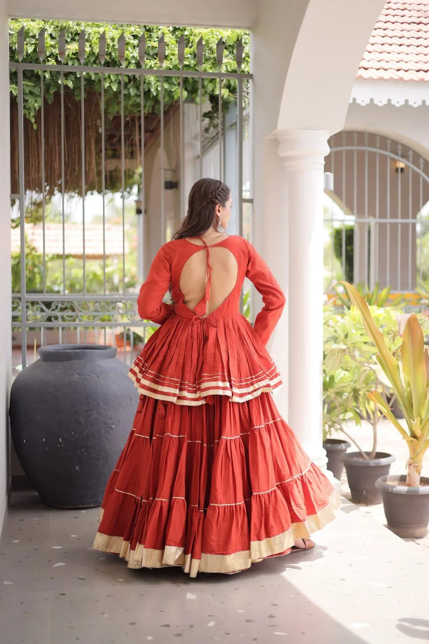 Rust cotton lehenga choli back view – open back dori design and 4-layer frill