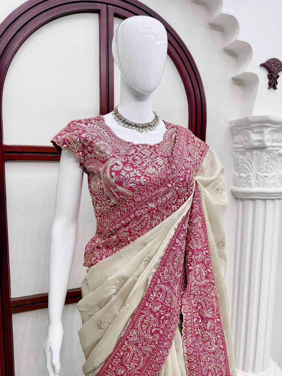 rani pink thread sequin embroidered bengalori silk blouse closeup cream organza saree