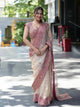 cream organza silk saree with rani pink thread sequin embroidered border model front view