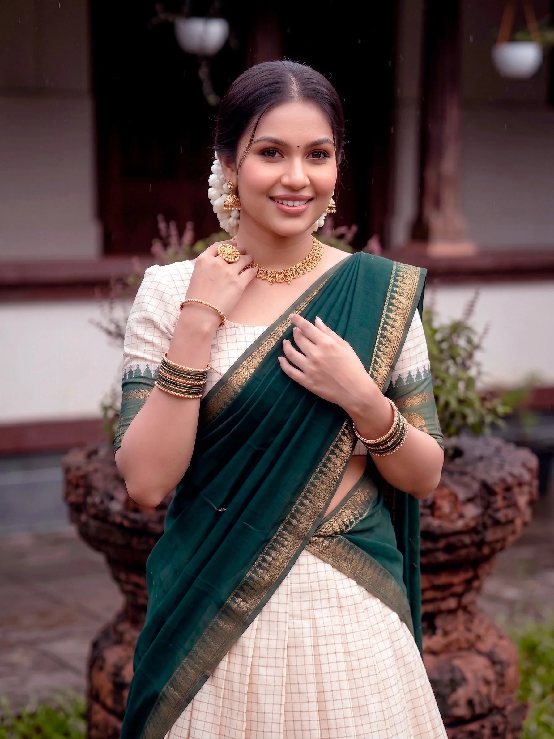 Cream poly cotton lehenga green elephant motif border close-up detail