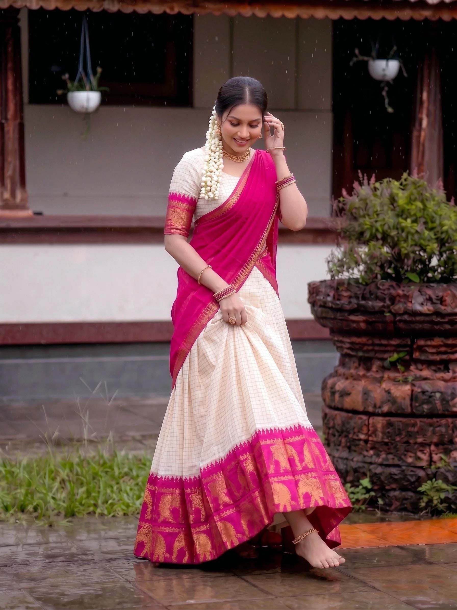 Cream poly cotton lehenga rani pink border side view two