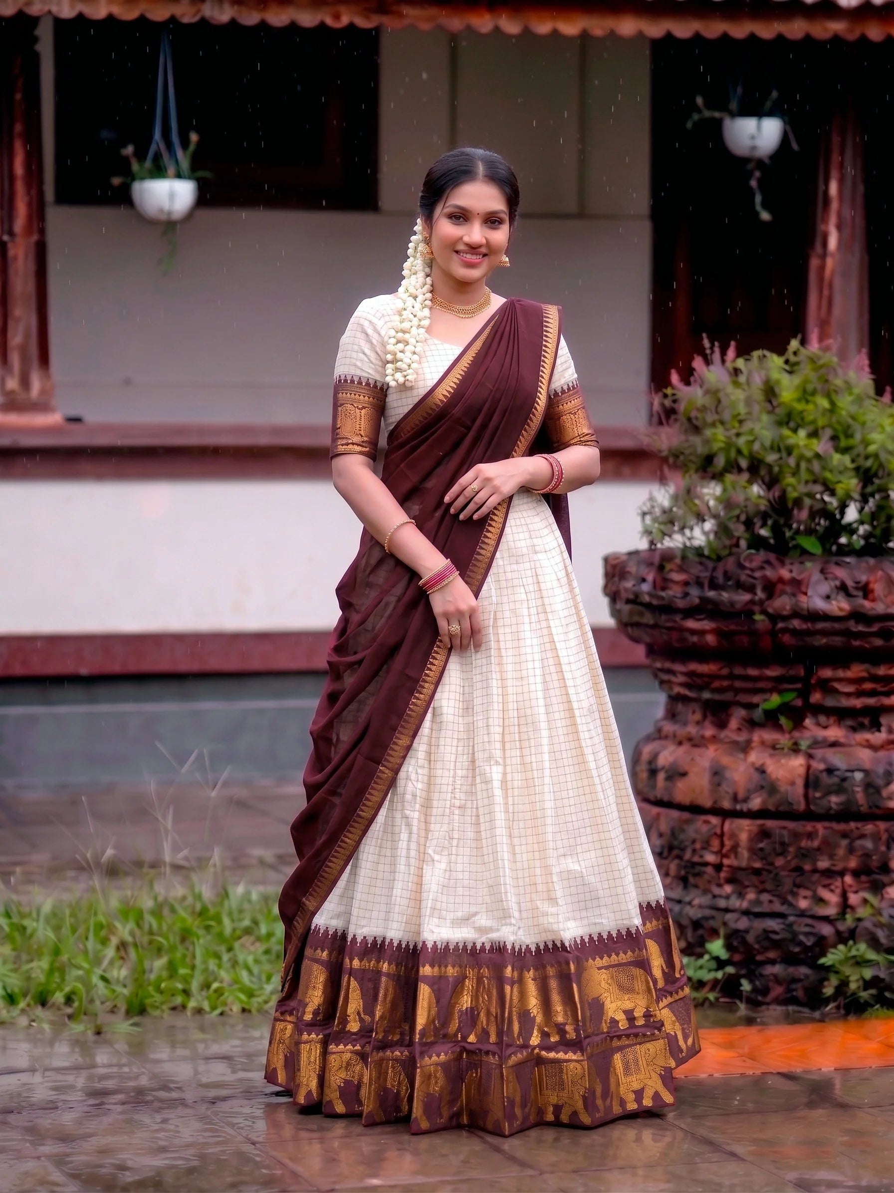 Cream poly cotton lehenga rani pink border side view dupatta draped