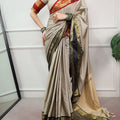 Cream silk saree with checks pattern ornate gold zari border full model view
