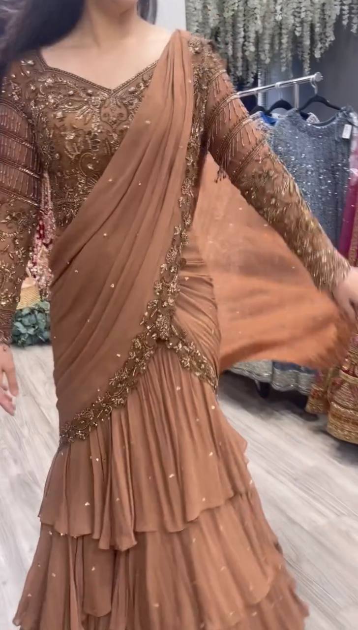 Dusty rose pre-draped lehenga saree with gold sequin embroidery and V-neck blouse – front drape view
