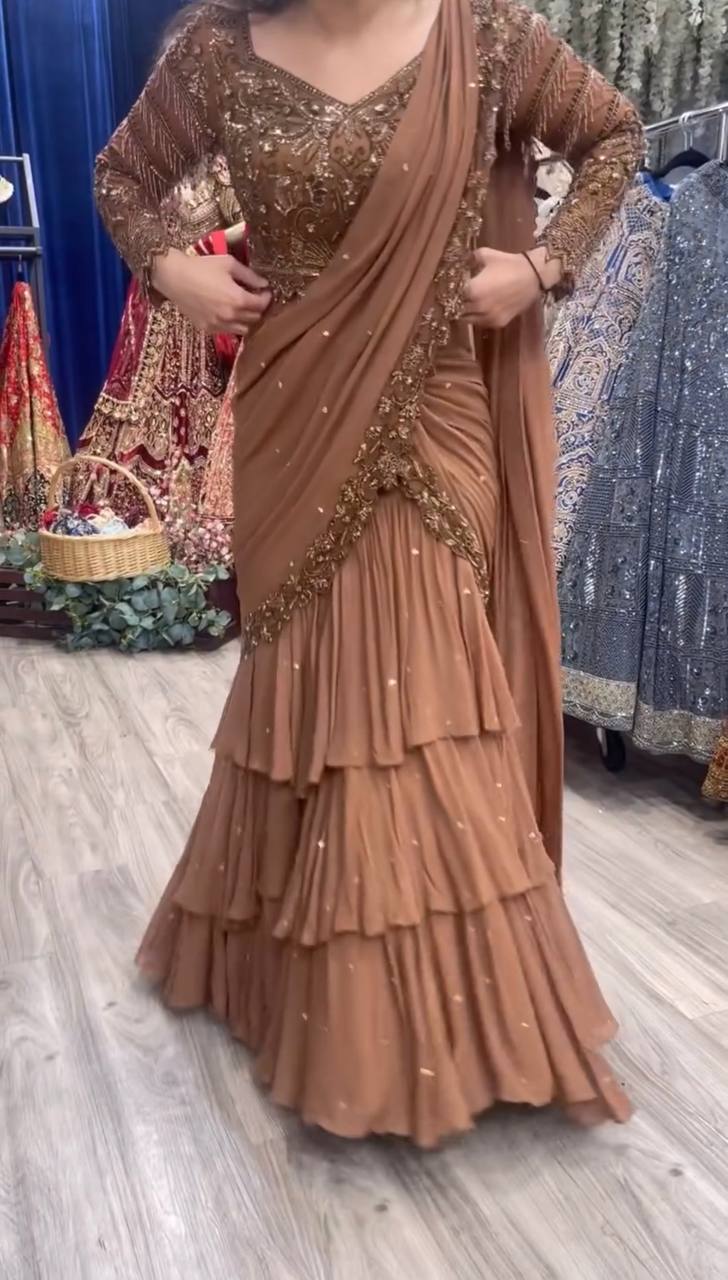 Pre-draped lehenga saree with tiered ruffle skirt and gold embroidery – full length side view