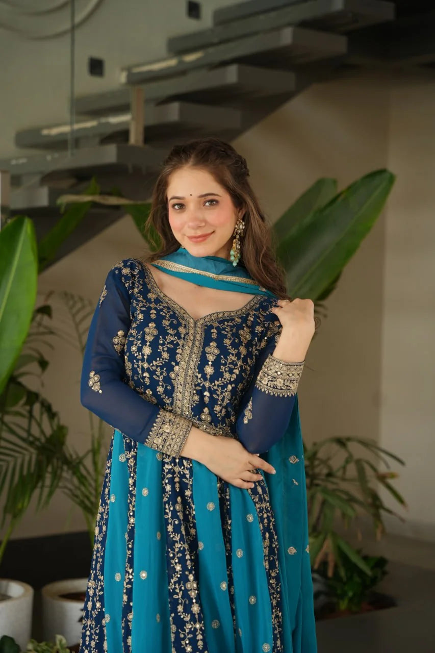 Navy blue teal faux blooming anarkali gown with dupatta standing pose