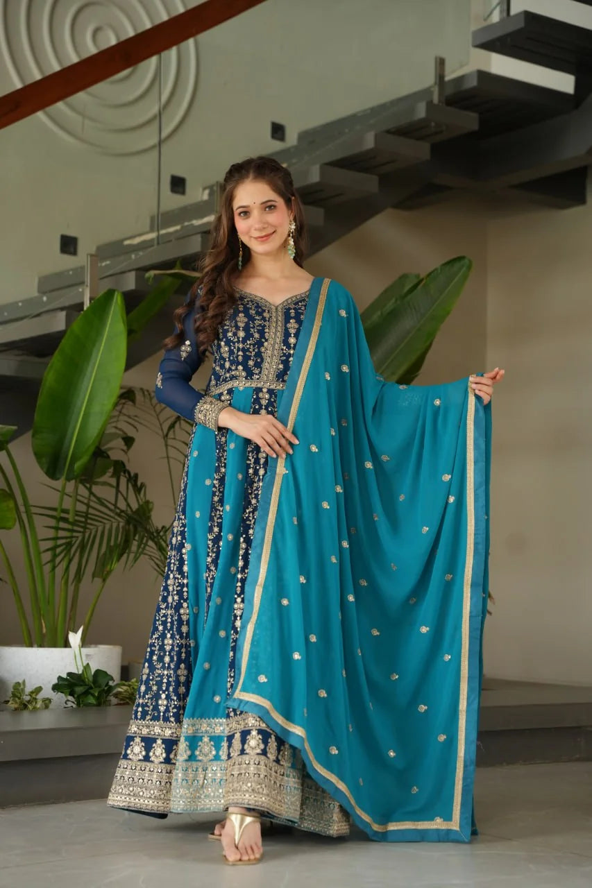 Dark purple lavender anarkali gown with dupatta standing festive pose