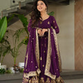faux blooming anarkali gown purple festive standing pose