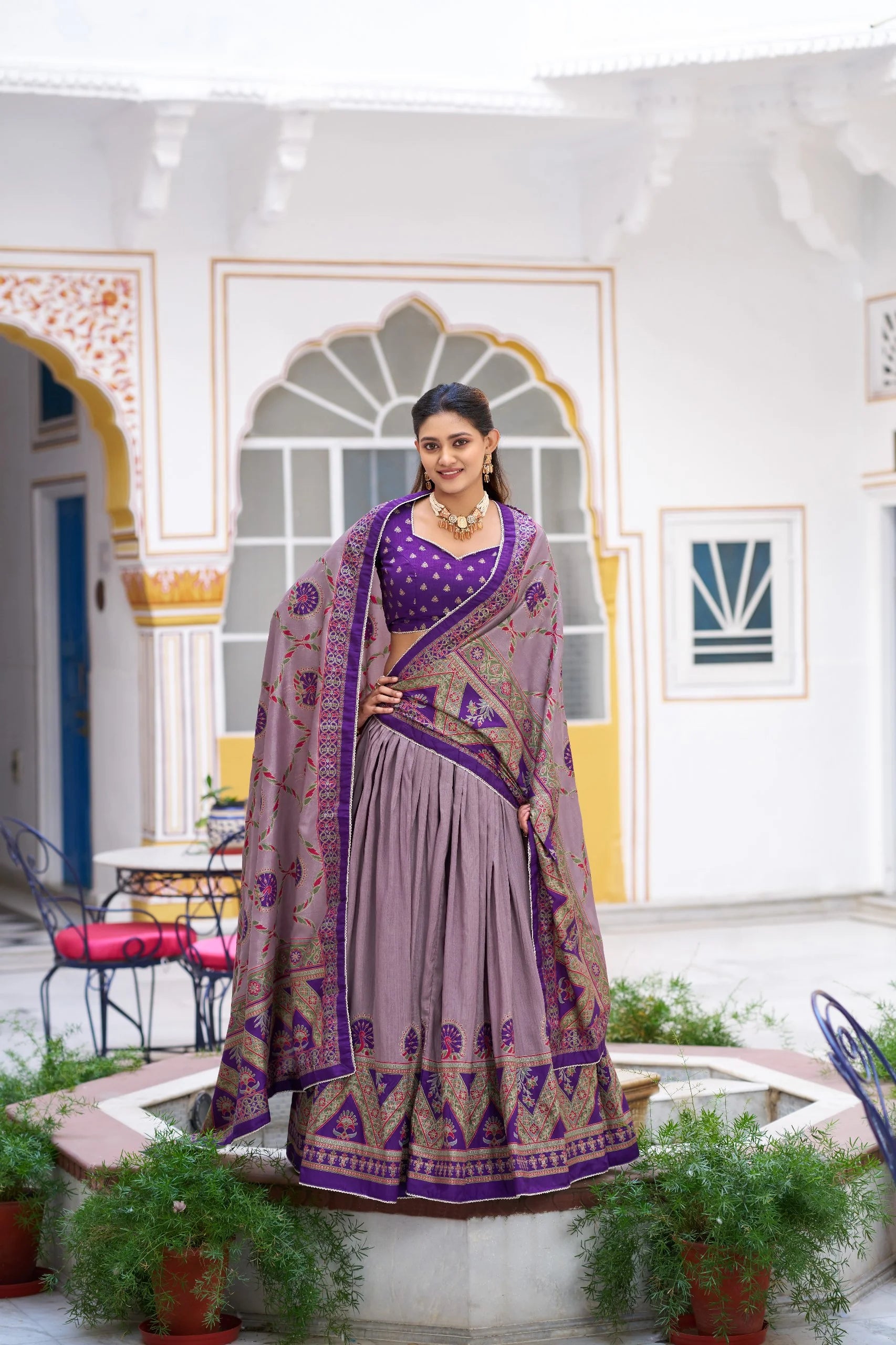 Dusty rose georgette lehenga set full length palace courtyard