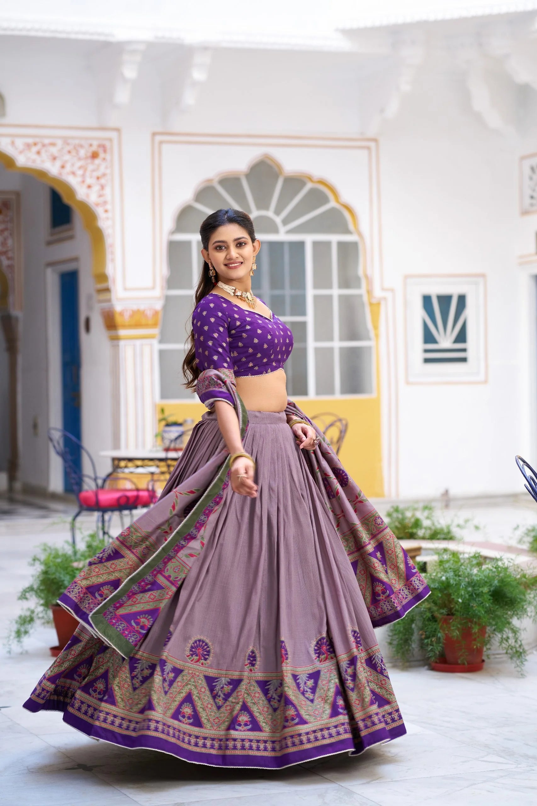 Dusty rose lehenga choli set leaning pose block print border detail