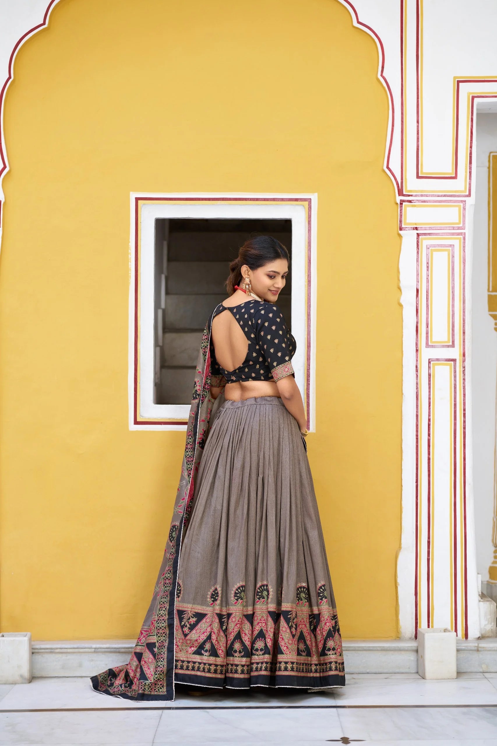 Grey faux georgette lehenga choli set back view showing full flared skirt