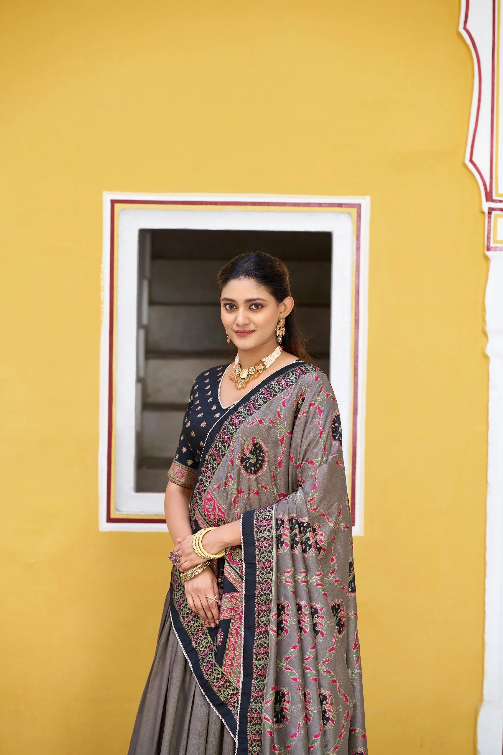 Grey lehenga choli set with dupatta draped – traditional block print detail