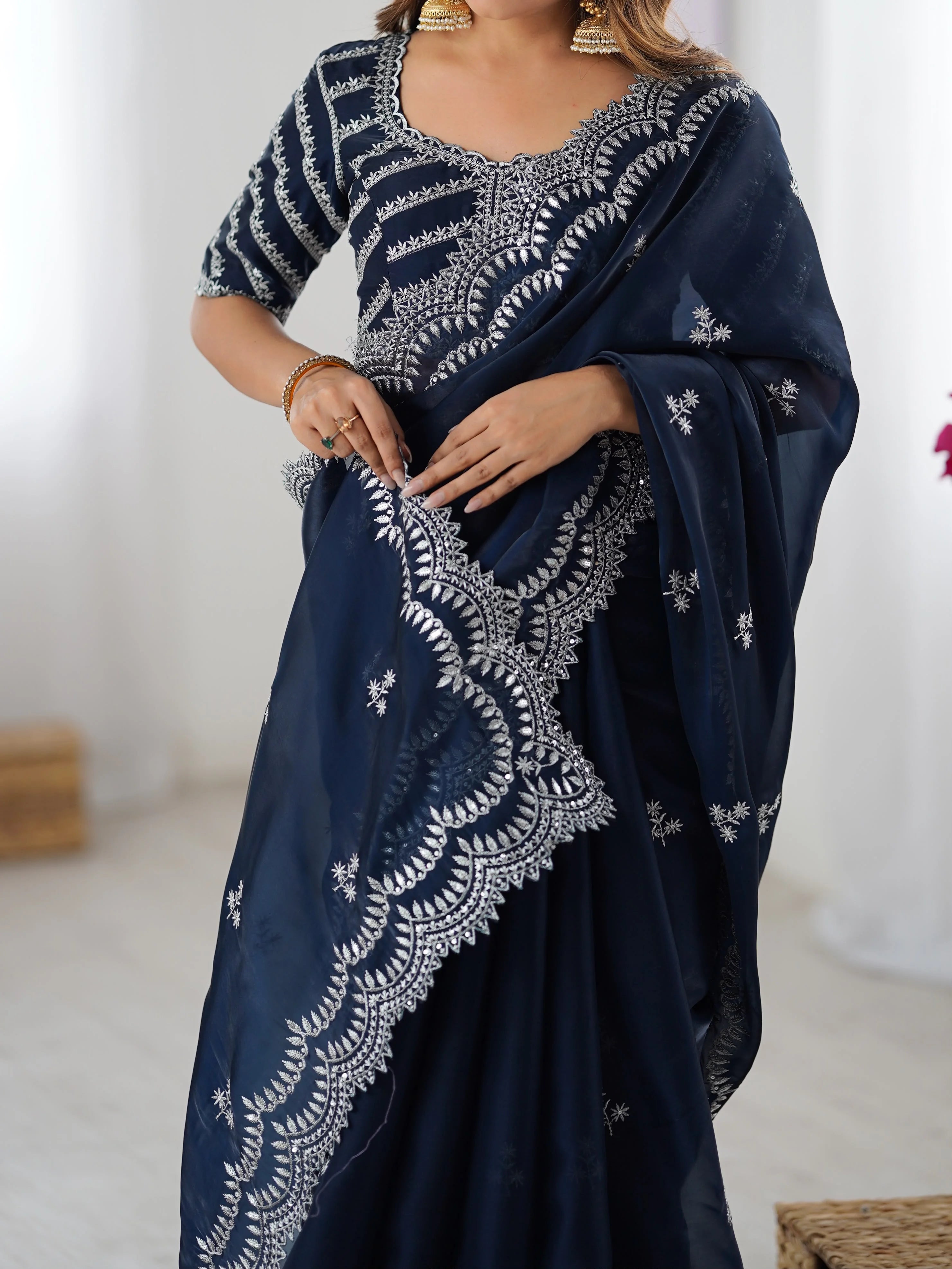 Navy blue georgette saree blouse detail — silver thread embroidery diagonal stripe design