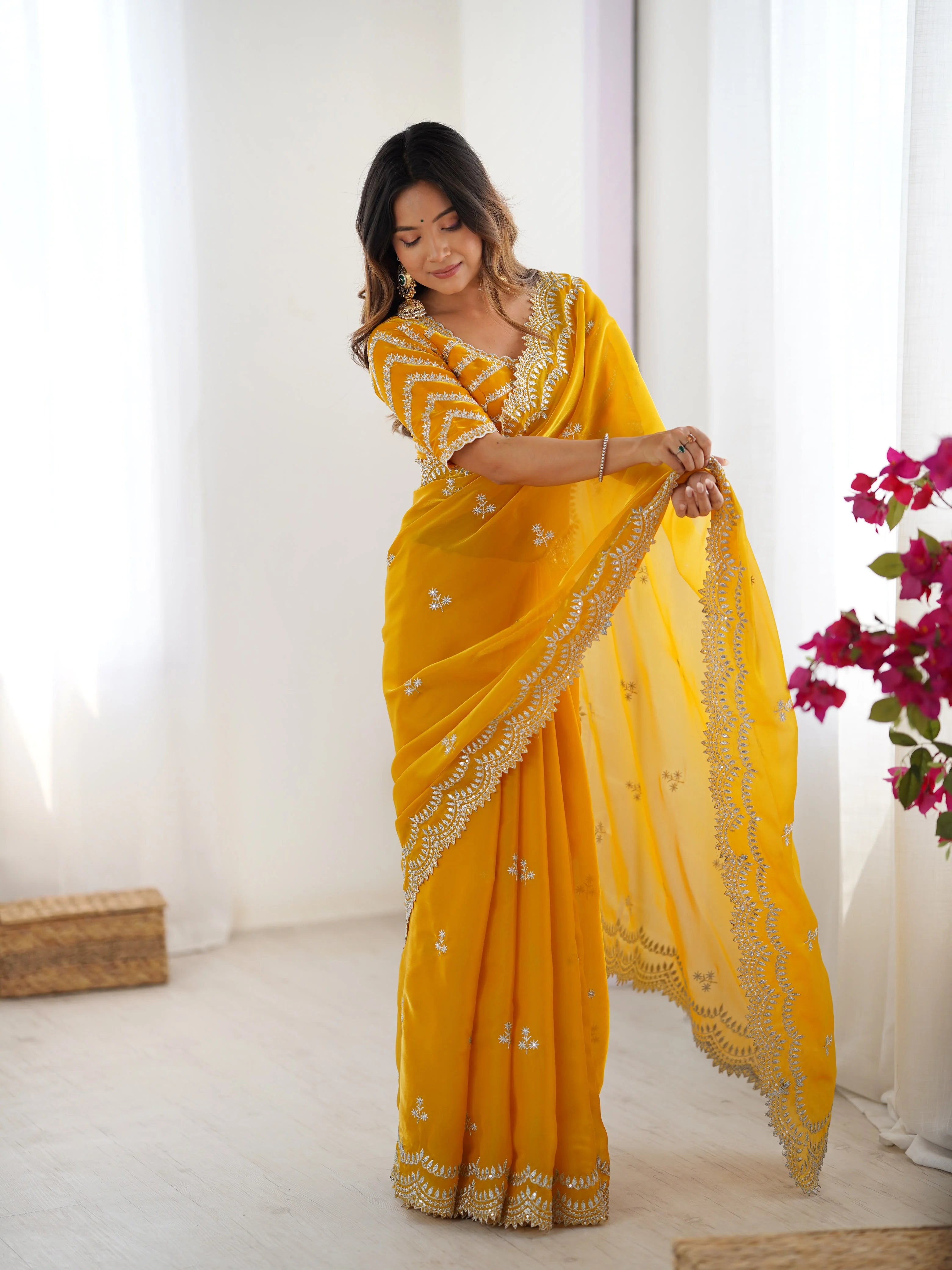 Faux georgette saree with thread embroidery purple — model full front looking down