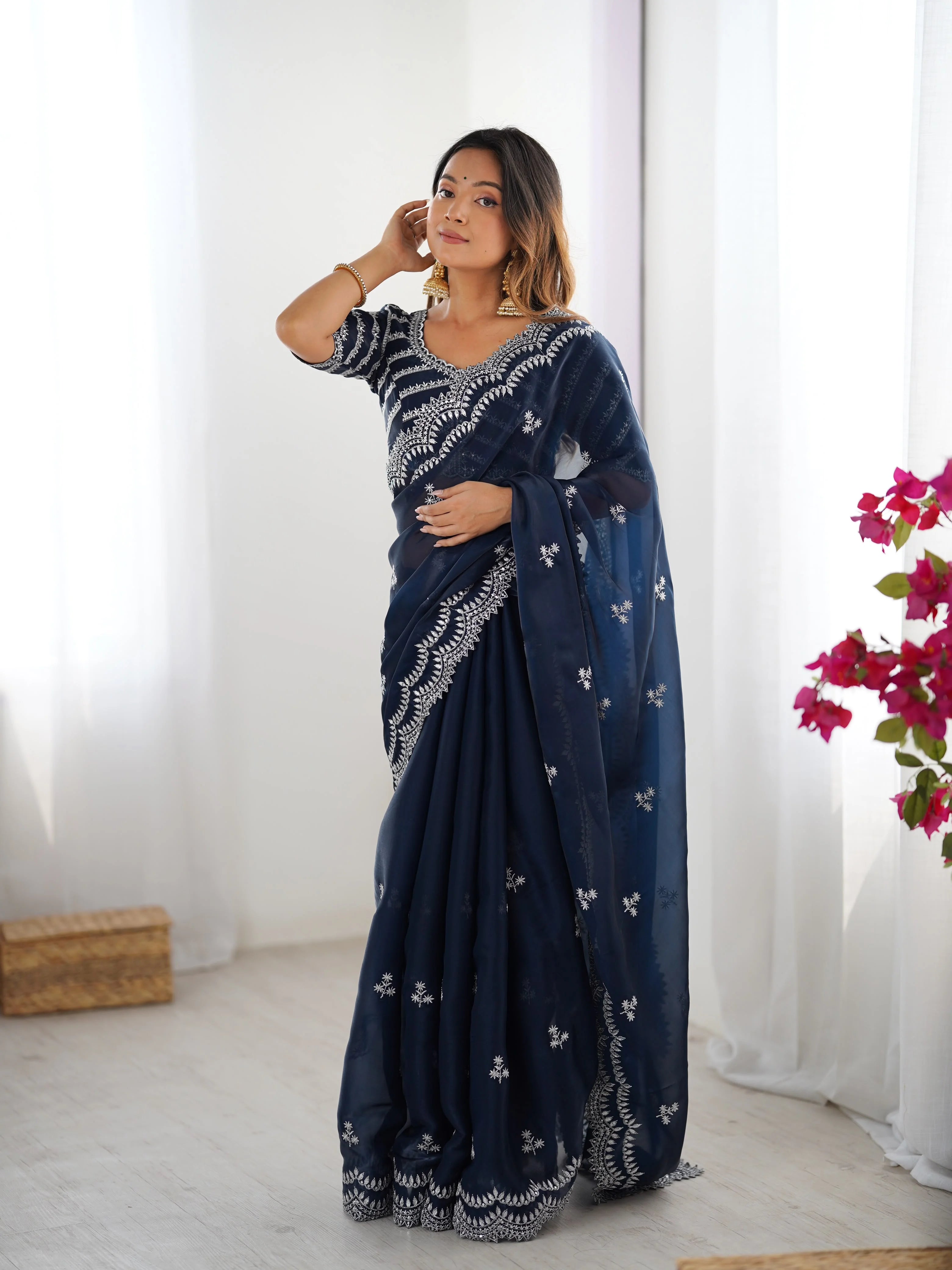 Yellow faux georgette saree thread embroidery — back view showing embroidered border