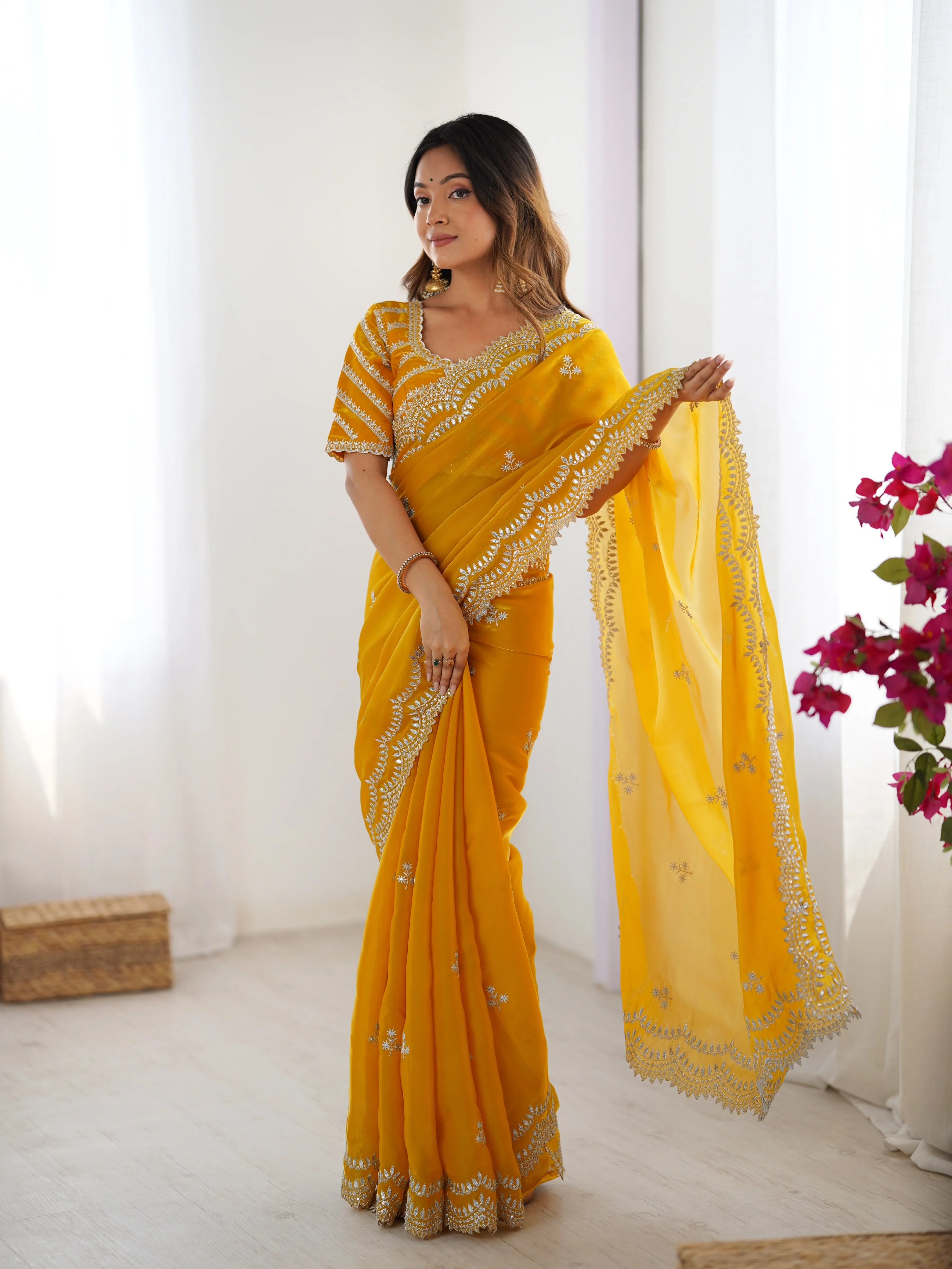 Faux georgette saree yellow with thread embroidery — side view showing full border
