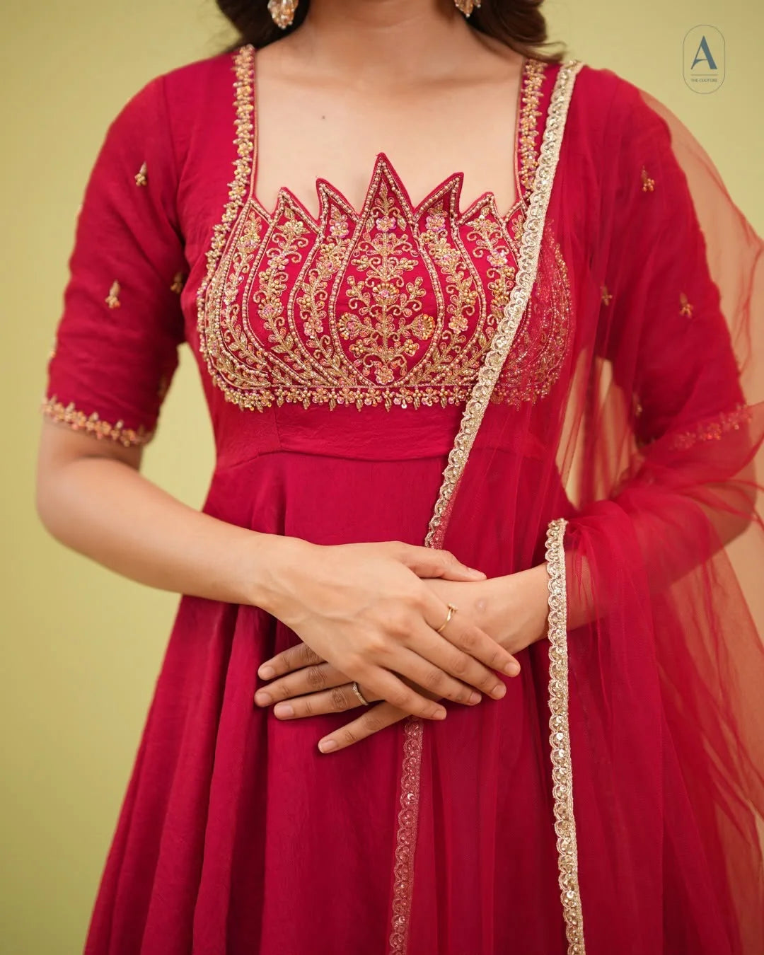 Fendy crush gown red bodice closeup showing bead cut-dana lotus petal embellishment