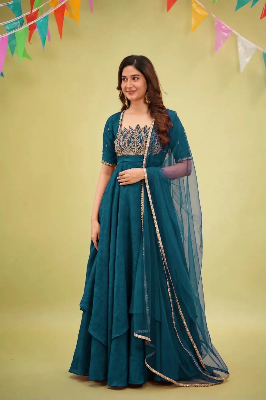 Fendy crush gown teal blue full length showing 7 metre flare with net dupatta