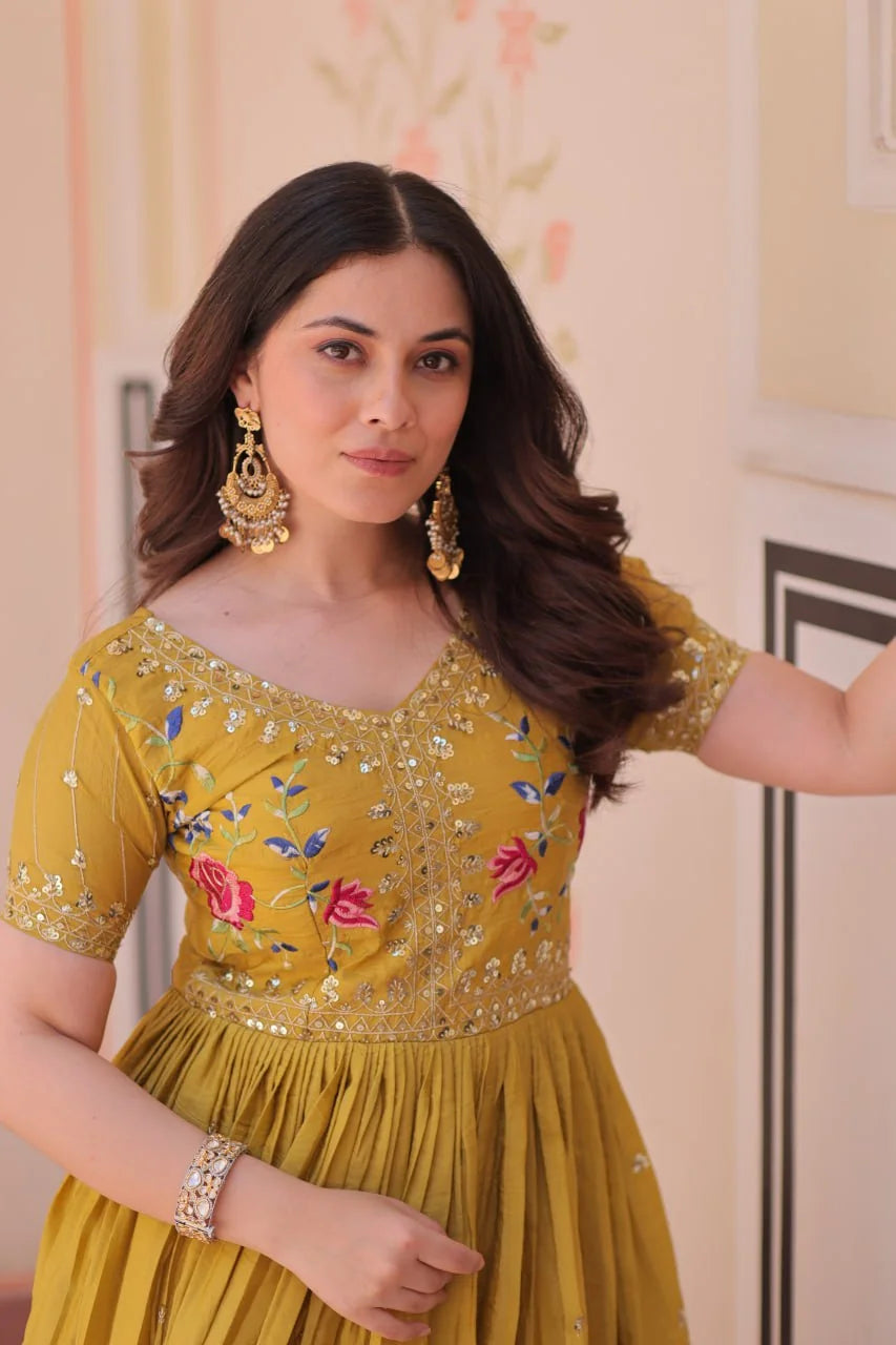 mustard floral gown detail with sequin sleeves