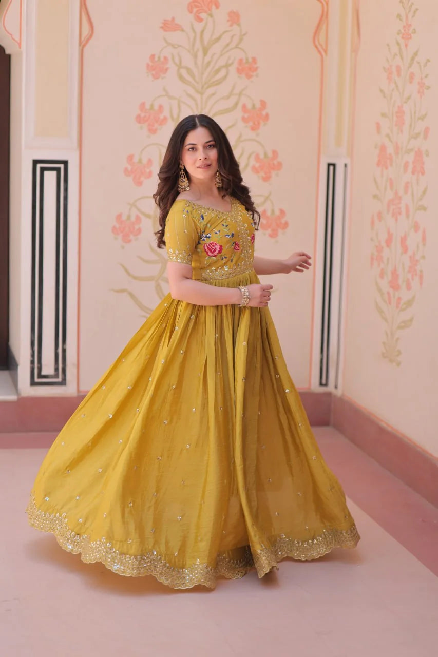 mustard floral gown twirl with flared skirt
