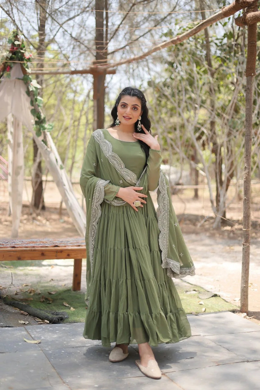 mehendi green gown with embroidered dupatta standing view