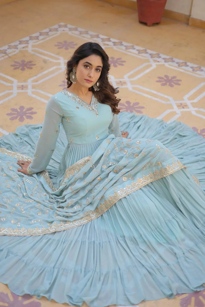 sky blue georgette gown with dupatta seated frill skirt spread