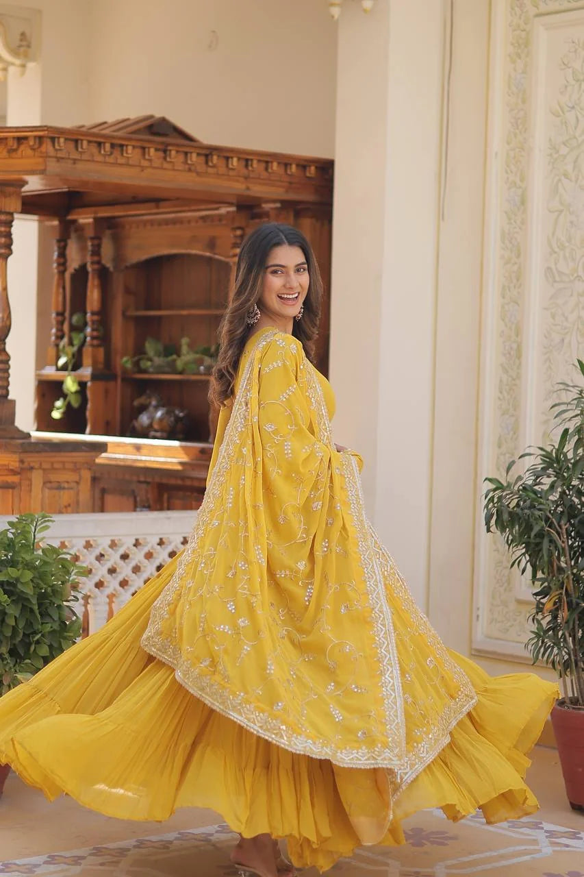 yellow georgette gown with dupatta back twirl view
