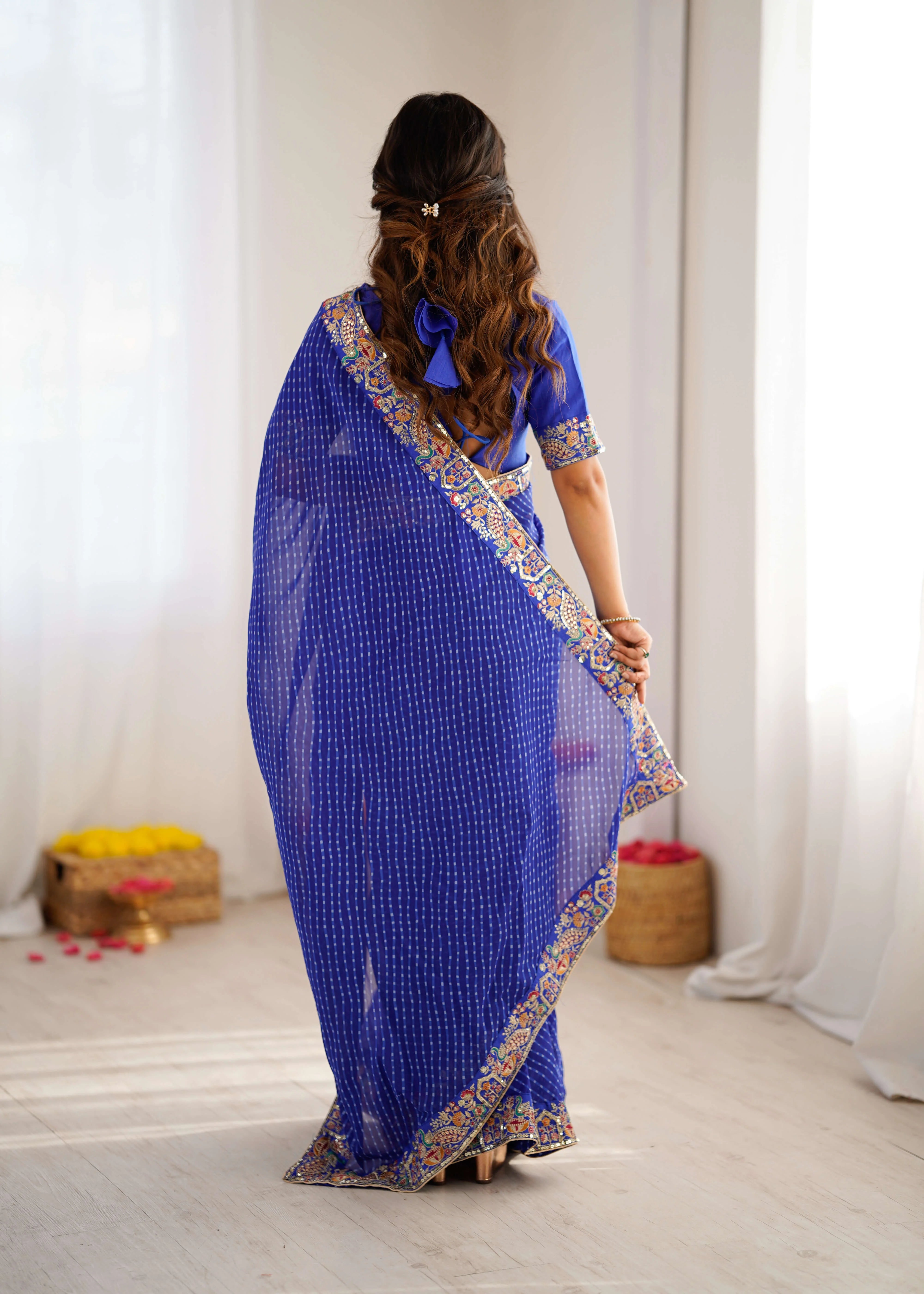 royal blue georgette leheriya saree back view