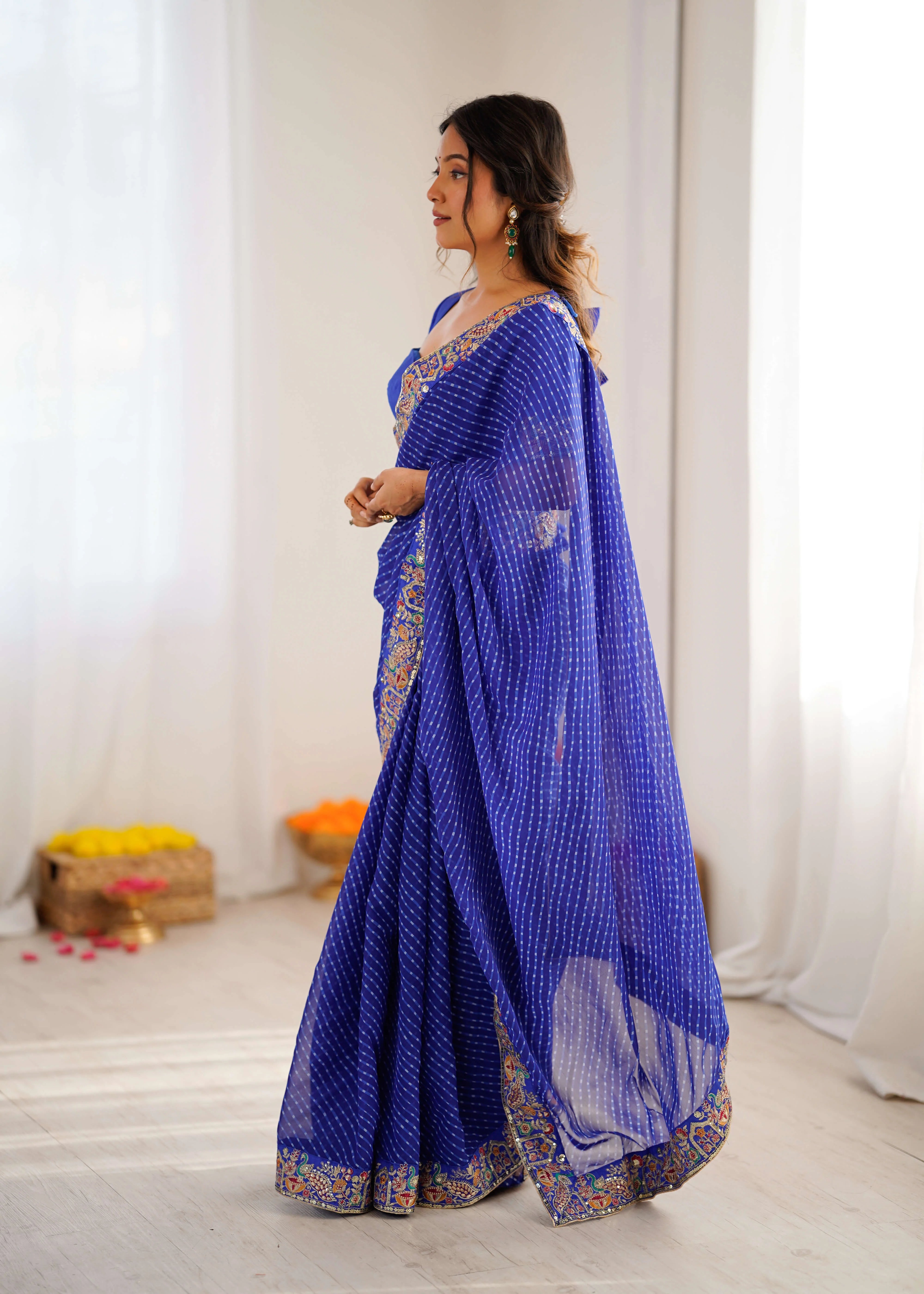 royal blue georgette leheriya saree side standing view