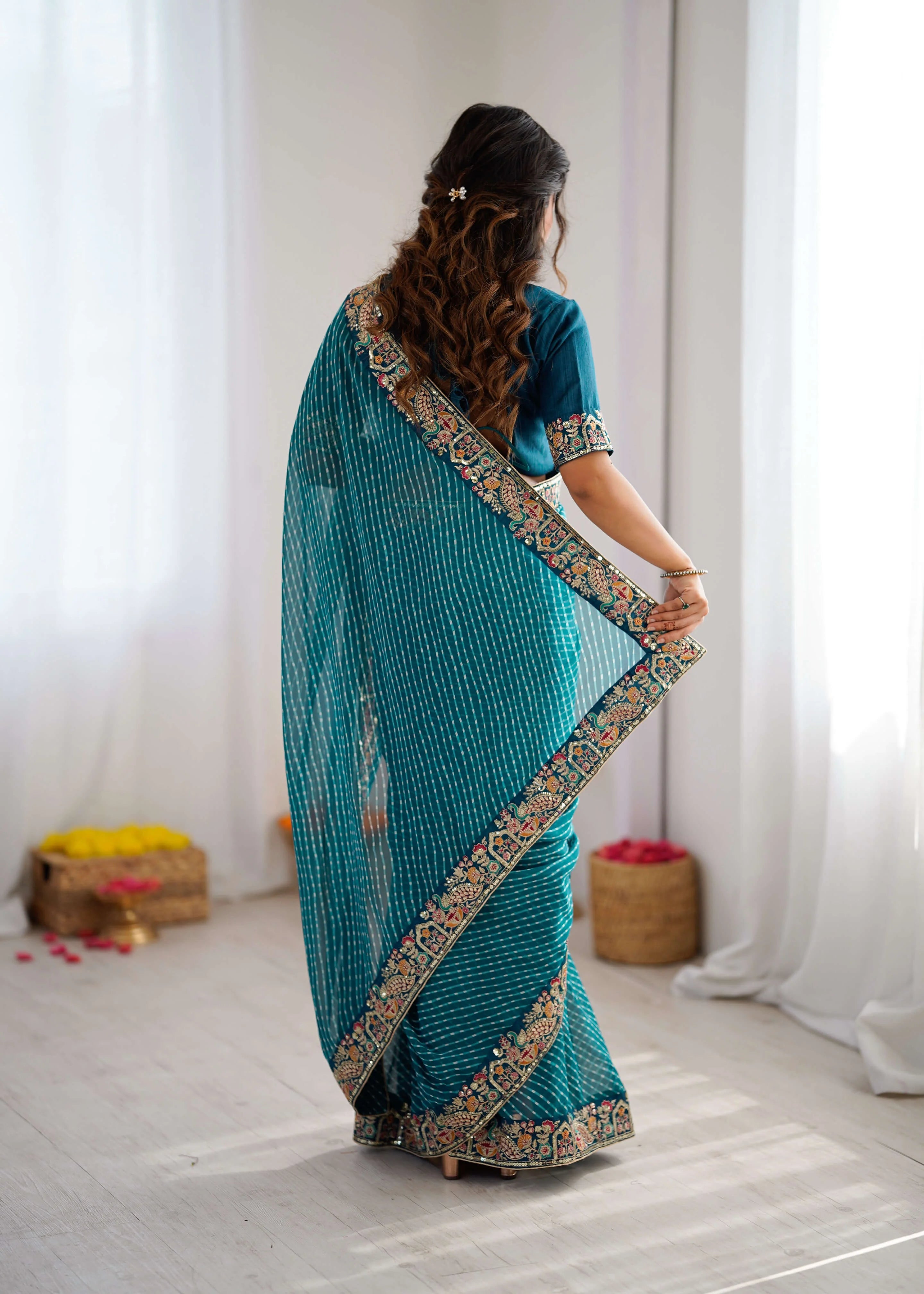 teal georgette leheriya saree back view