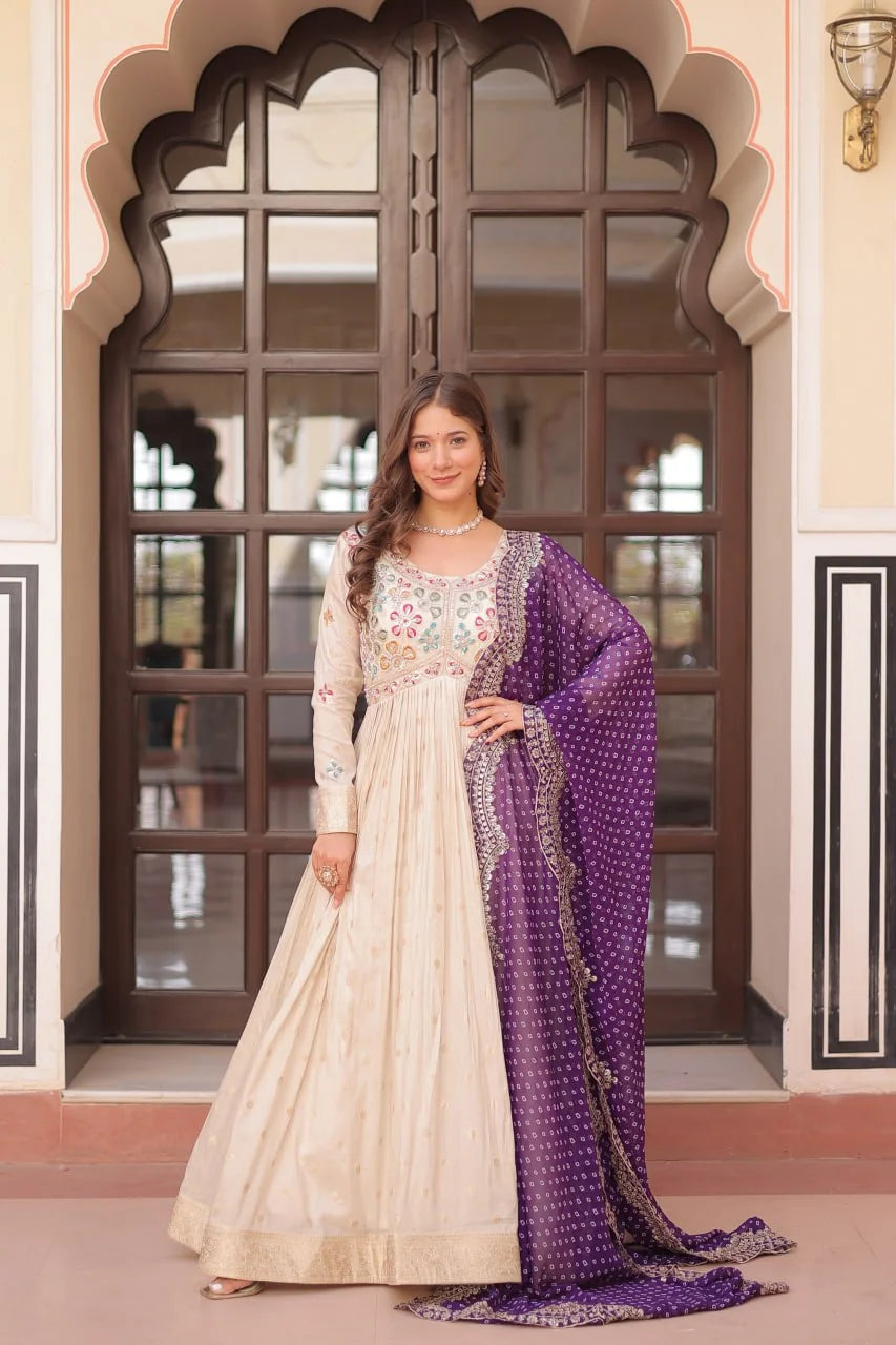 ivory gown with purple bandhani dupatta front view